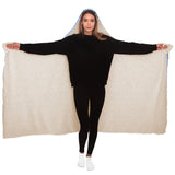 woman standing in doberman blanket