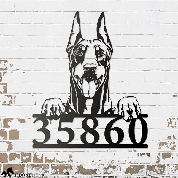 Doberman metal house number on brick