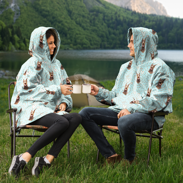 Man and woman wearing personal dog hoodie