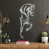 silver metal dressage horse wall art in dark wall