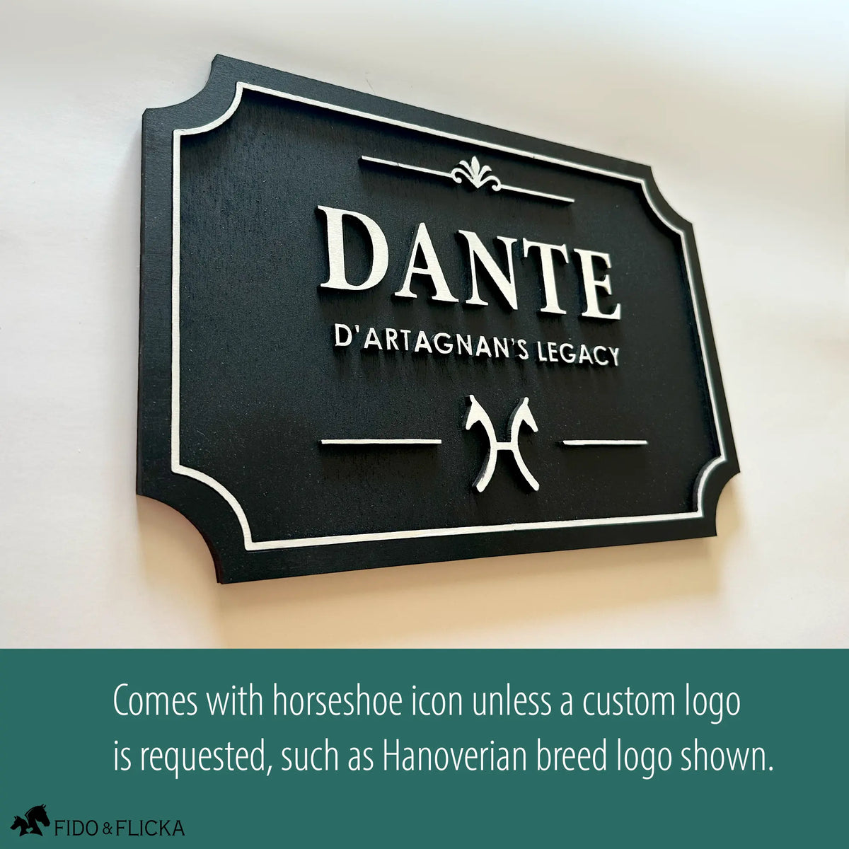 Personalized horse stall sign in layered Baltic birch with white on black finish, shown with custom Hanoverian breed logo. Standard design includes horseshoe icon unless a custom logo is requested