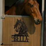 horse stall name plate in black metal on horse stall