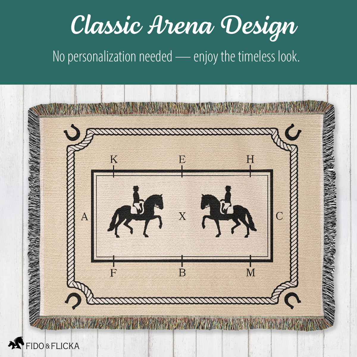 Beige blanket with horse and rider design on a wooden floor, featuring text about timeless design.