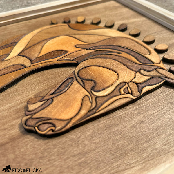 Extreme close-up of a handcrafted wooden horse head wall art, highlighting the intricate layers and rich wood grain variations. The image focuses on the sculpted facial features, showcasing precise craftsmanship and natural staining in warm tones, set against a smooth wood background.