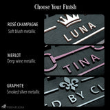 Three metallic finish options for personalized horse stall name plates: Rosé Champagne soft blush, Merlot deep wine, and Graphite smoked silver.