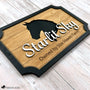 Layered wood horse stall sign with a black head-portrait silhouette and the name ‘Starlit Sky’ in raised white script, shown at a slight angle to highlight the 3D layers and wood texture.