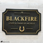 Custom horse stall sign made from layered Baltic birch wood, gold on black finish with personalized name and horseshoe design – durable equestrian barn name plaque.