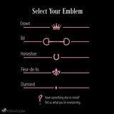 Emblem options for custom horse stall signs including a crown, horse bit, horseshoe, fleur-de-lis, diamond, and custom design option.