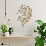 Decorative wall art of a horse head on a white wall with plants and a table.