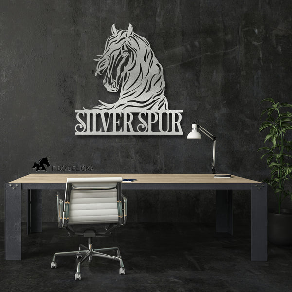 silver horse farm sign on dark wall in office