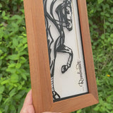 rustic cedar wood frame complements sleek metal art