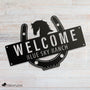horseshoe farm and ranch welcome sign