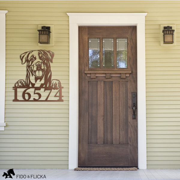 Rottweiler metal house number sign in copper by front door of home