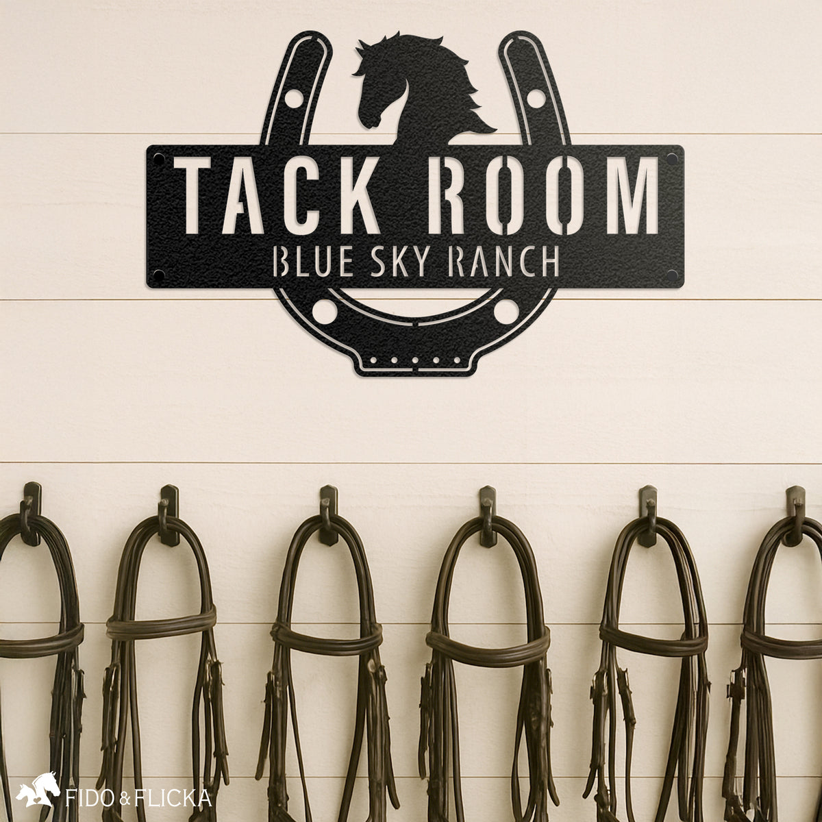 metal personalized tack room sign on wall with ranch name