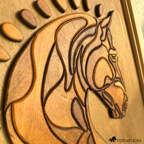 Close-up angled view of a handcrafted layered wood horse head wall art, showcasing detailed carving, smooth contours, and varied wood stains that enhance the dimensional texture. The horse’s mane and features are intricately formed, highlighting the craftsmanship against a warm wooden background.